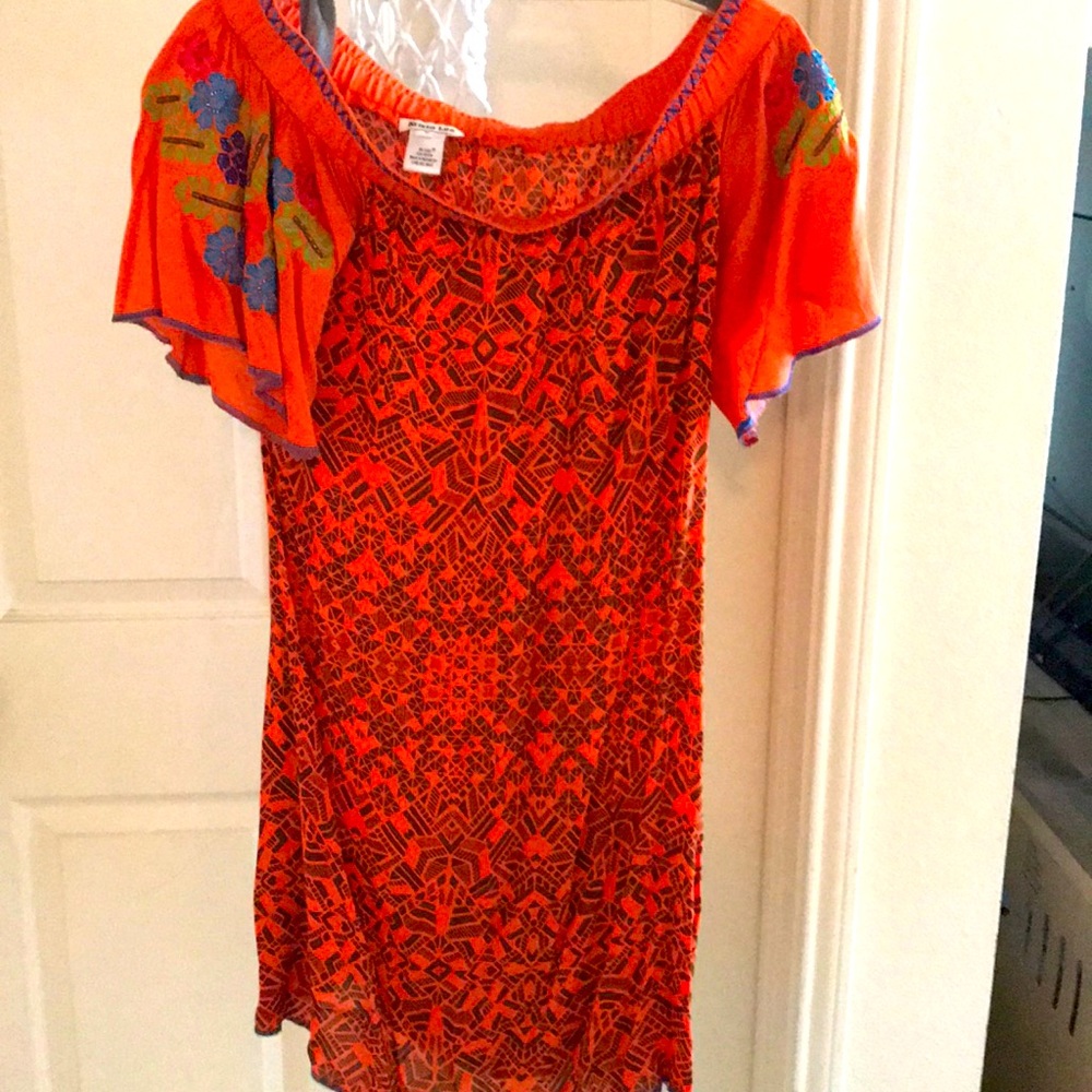 A Sassy embroidered dress detail on shoulders